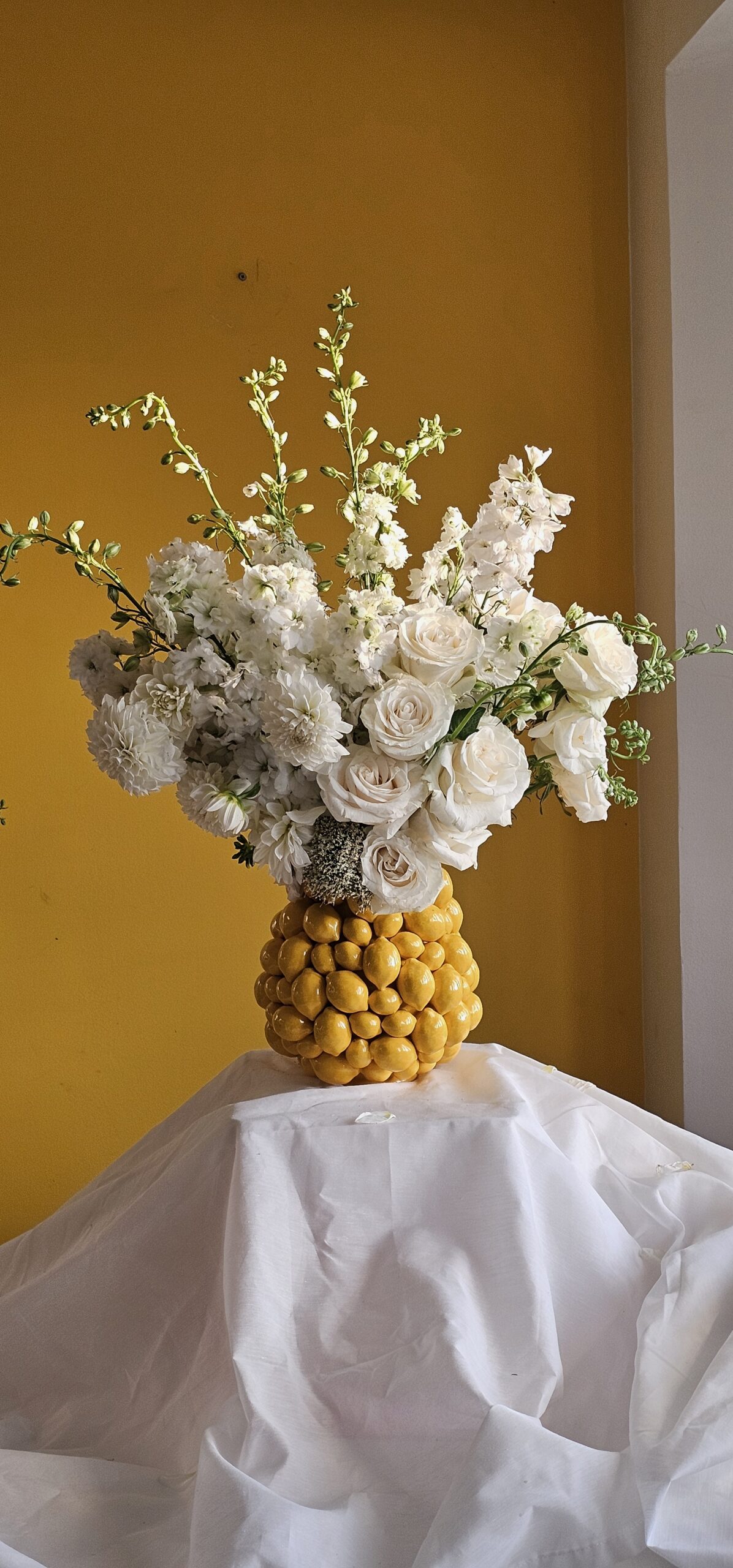 Classic bridal bouquet in white, cream and green.